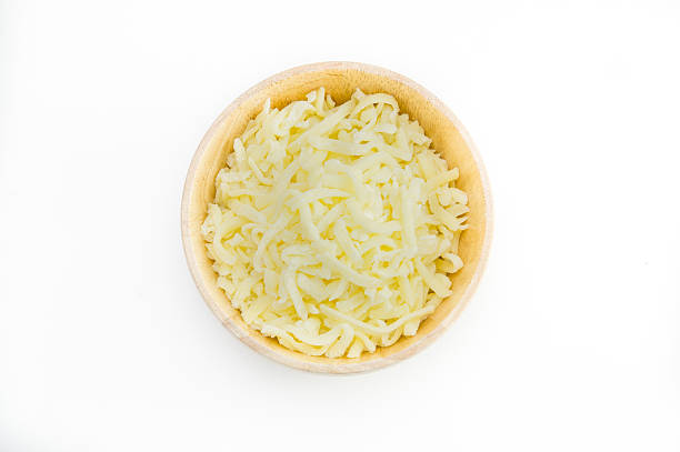 istock Grated cheese in a wooden bowl 490130546