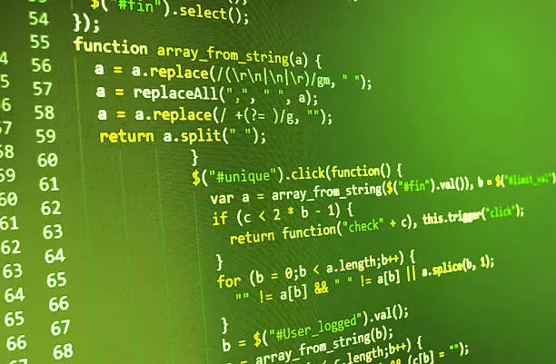 Photo of Software developer programming code on computer