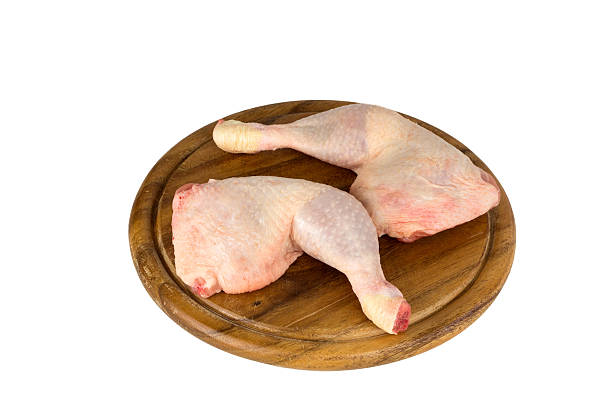 fresh poultry clubs fresh poultry legs on wooden board hänchenfleisch stock pictures, royalty-free photos & images