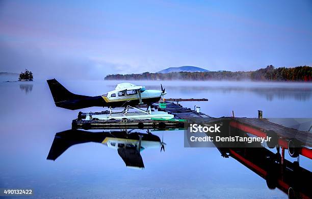 Seaplane On A Calm Lake In Maine Stock Photo - Download Image Now - Autumn, Maine, Seaplane