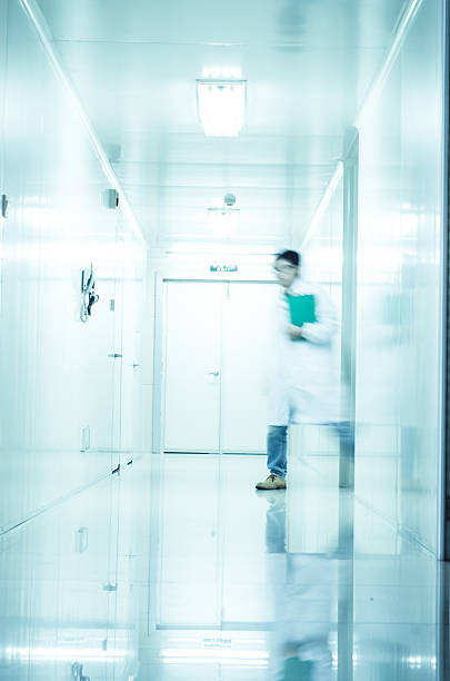istock people walking in modern laboratory,abstract blur 490134163