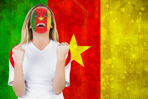 istock Excited cameroon fan in face paint cheering 490135495