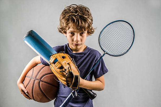 istock Little boy playing many sports at same time 490135594