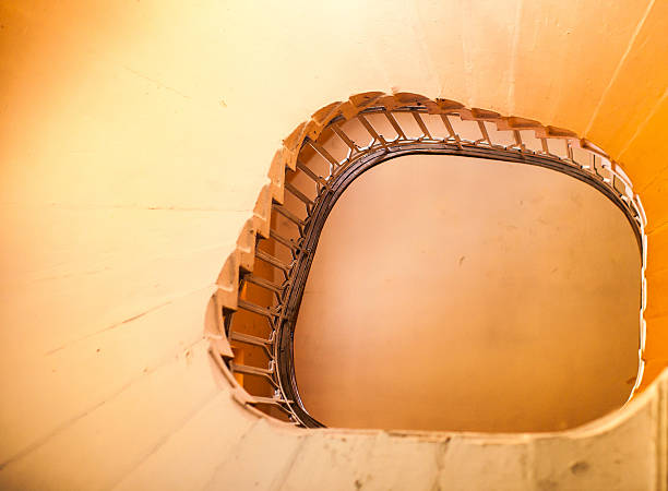 istock Old orange abandoned stairs abstract 490135855