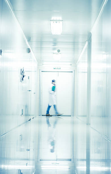 istock people walking in modern laboratory,abstract blur 490136375