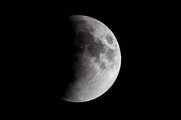 Lunar Eclipse of the Moon DSLR picture of The beginning phase of a lunar eclipse that took place on September 27, 2015. lunar eclipse stock pictures, royalty-free photos & images