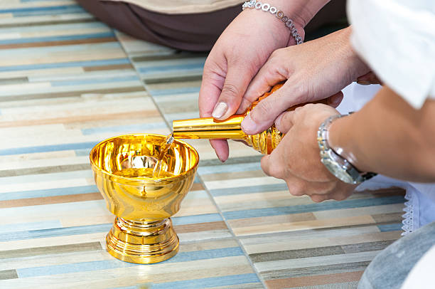 istock Buddhist's grail pouring water 490138476
