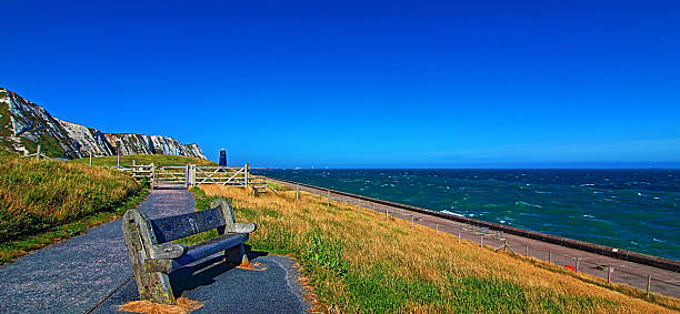istock Bench near Samphire Hoe Tower along Cliffs of Dover coastline 490140012