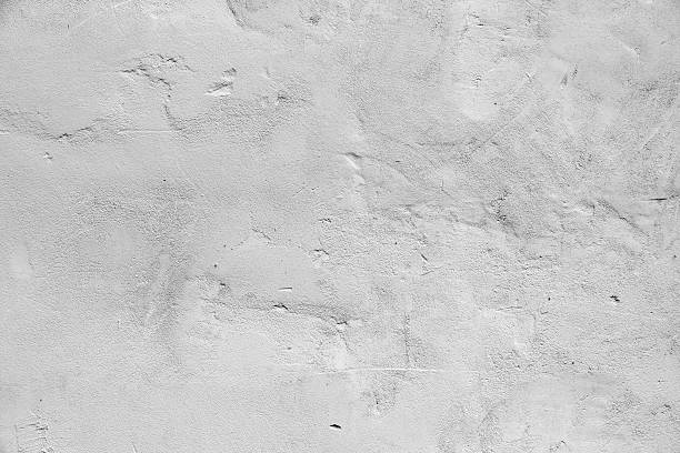 istock Gray concrete wall with relief details, background 490140824