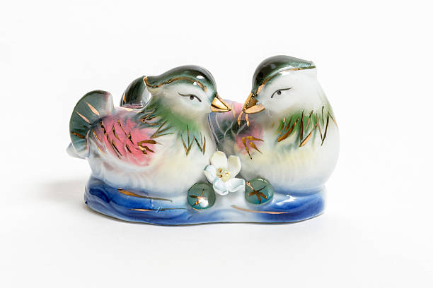 ceramic Mandarin ducks Feng Shui on a white background