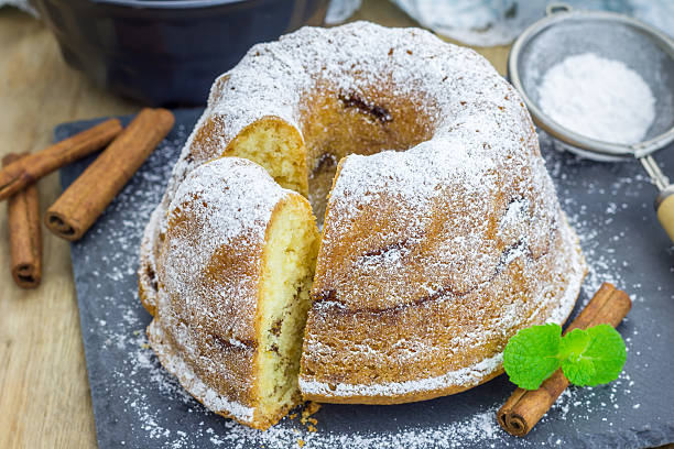 istock Freshly baked homemade circle coffee cake with cinnamon, sliced 490176626
