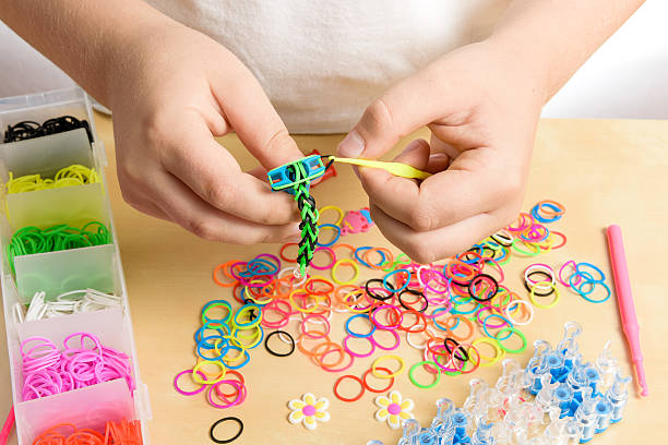 istock Rainbow loom- Colored rubber bands for weaving accessories 490176904
