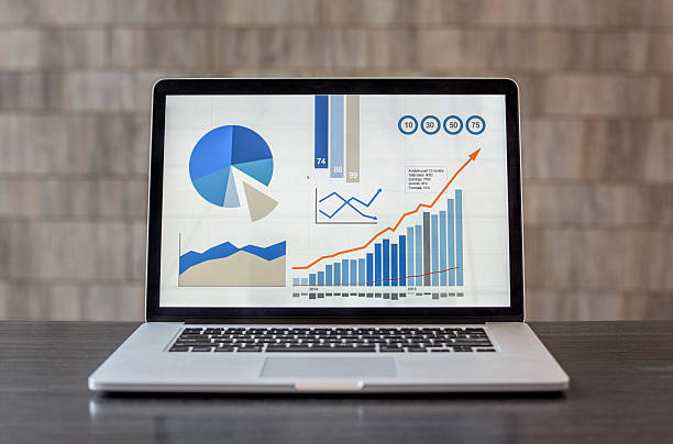 istock Laptop showing business graphs at the office 490178094