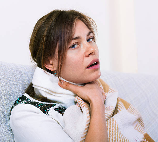 istock Young  woman having heavy sickly tonsillitis 490183322