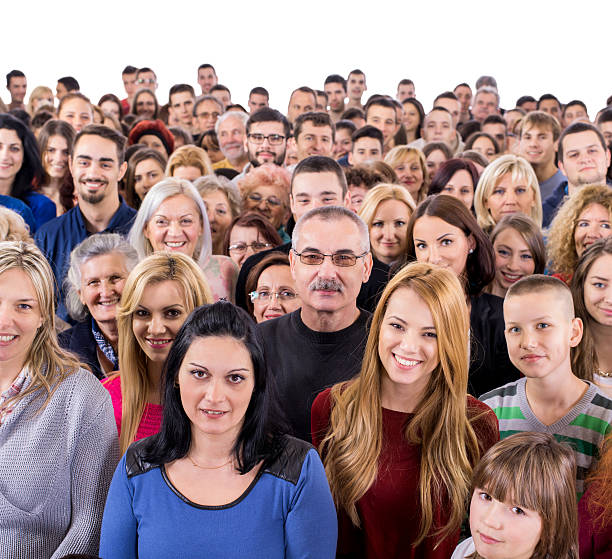 istock Large group of smiling people looking at camera. 490183750