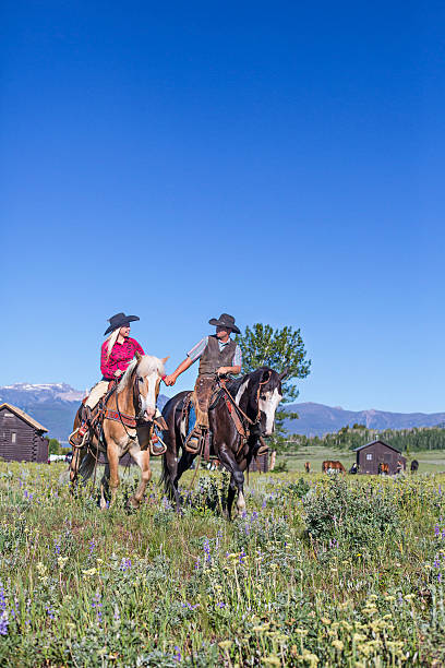istock Couple riding a horse in Montana 490185718