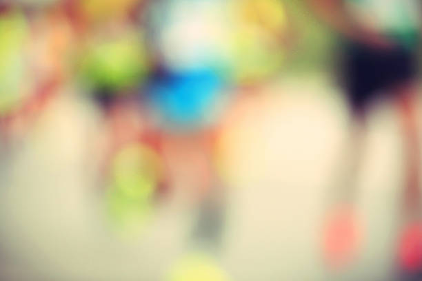 Marathon runner running on city road