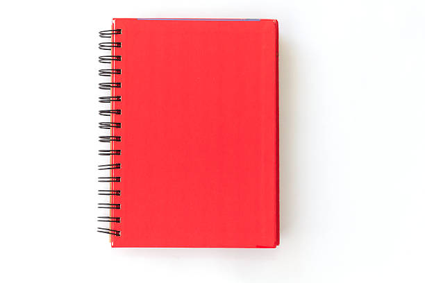 quaderno a spirale rossa su sfondo bianco - spiral notebook foto e immagini stock