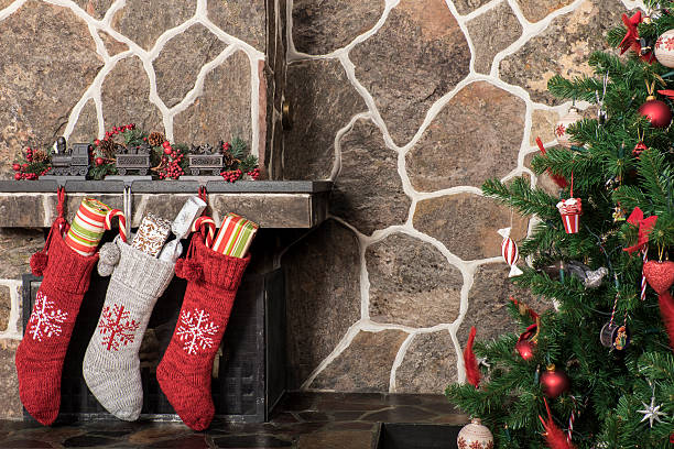 istock Christmas stockings and tree 490186994