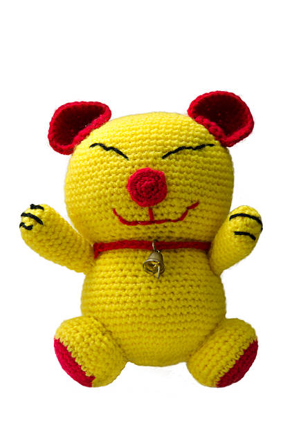 istock handmade crochet yellow cat doll on white background 490187266