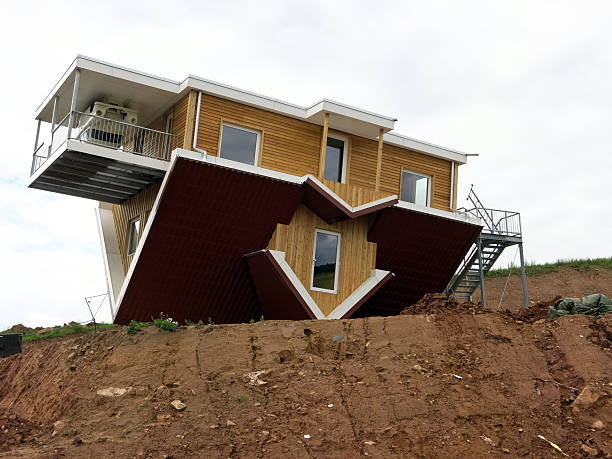 Wertheim, Germany - September 23, 2015: construction site of a house. The building stands upside down near the factory outlet Wertheim Village in Germany, Baden-Wurttemberg.If this building is ready it will be probably used for advertising.