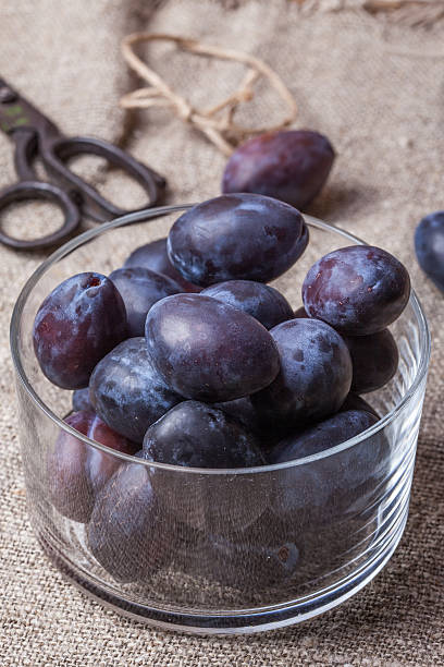 istock Plums in a glass bowl. 490188522