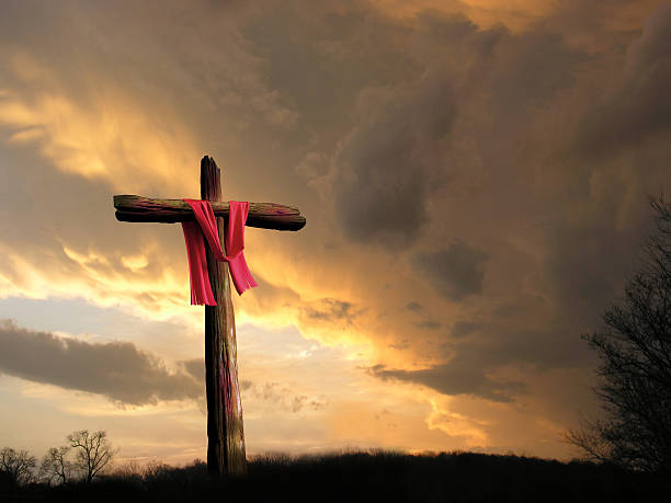 Cross in Storm The scene after the crucifixion as described in the Bible. The cross and garment have been blood-stained. The Bible says, "There was darkness over all the land. The earth did quake and the rocks rent." hell photos stock pictures, royalty-free photos & images