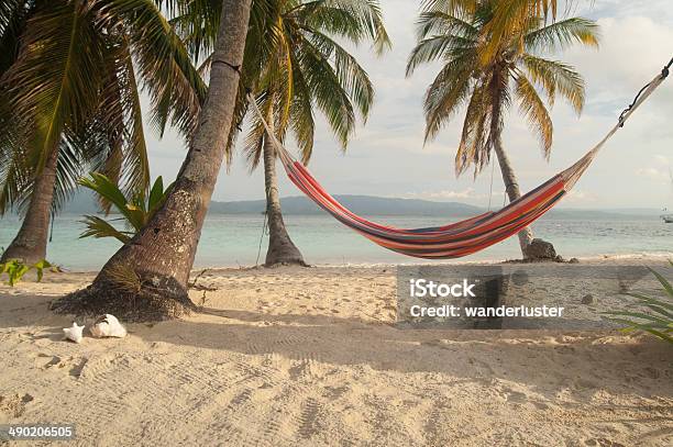 Hammock Between Palm Trees In Kuna Yala Panama Stock Photo - Download Image Now - Beach, Hammock, Panama