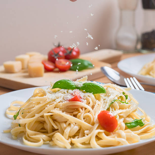 istock Spaghetti pasta sprinkled with parmesan 490212004