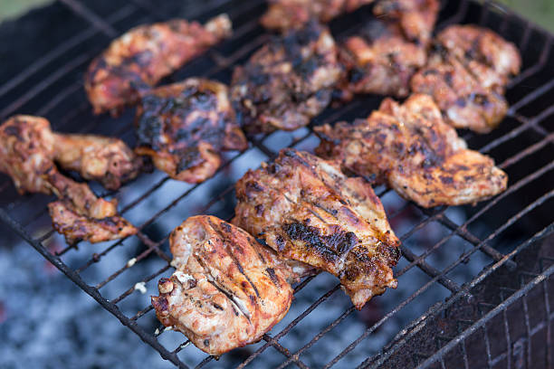 istock Roasted barbecue meat on charcoals of grill 490220584