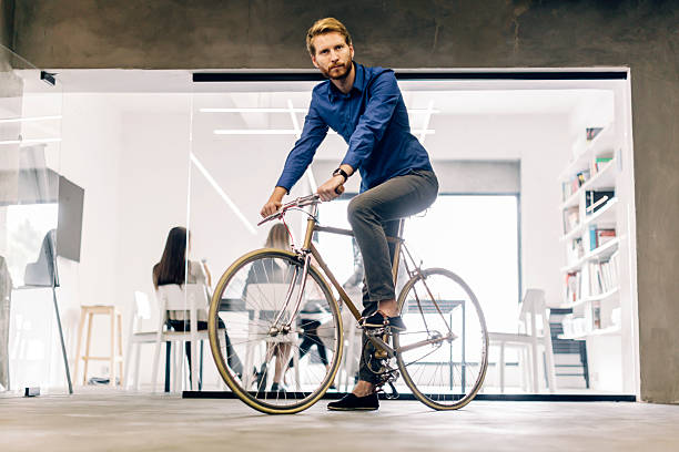istock Businessman riding a bicycle 490222588