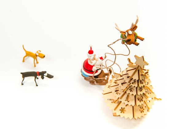 istock Reindeer pull up Santa sleigh into sky near Christmas tree 490222694