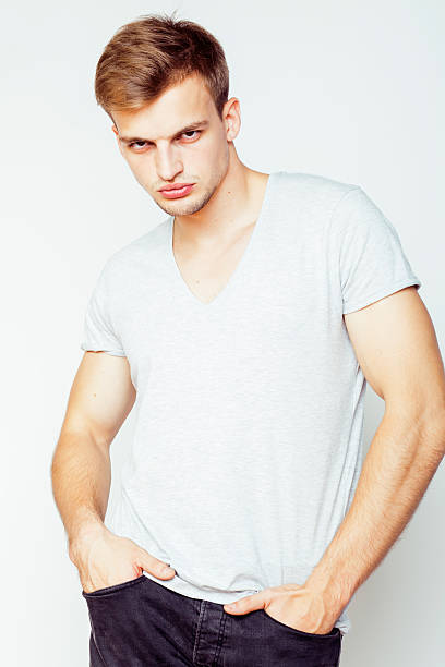 istock young handsome man on white background gesturing, pointing, posing emotional 490223582