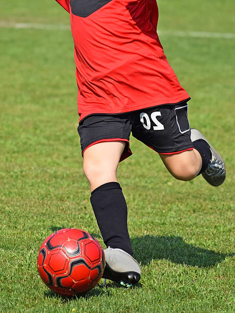 istock Kick off on a kid soccer match 490224342