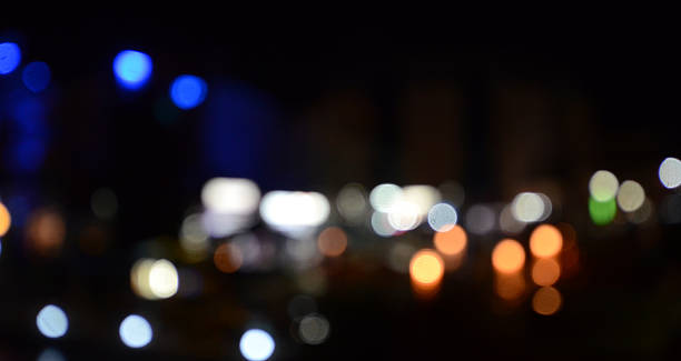 istock Blurred city  riverbank lights 490224608