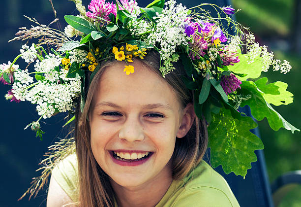 istock Happy smiling girl with flower wreath 490224812