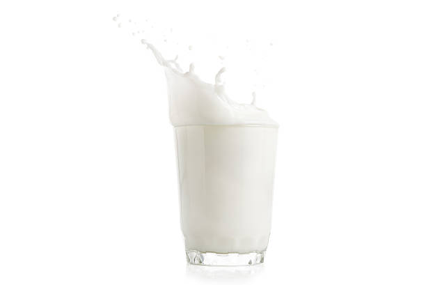 istock Splash of milk in glass isolated 490224838