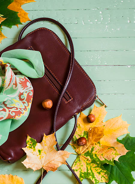 istock women's fall accessories - the scarf and bag 490237814
