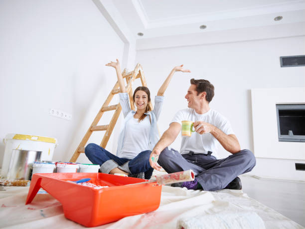 istock Couple taking a break from painting 490238976