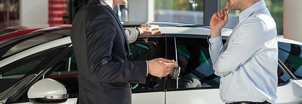 istock Man buying a car 490240038