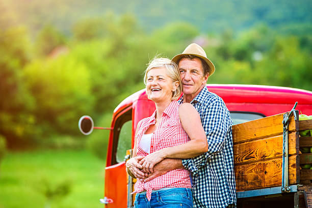 istock Couple with red truck 490240782