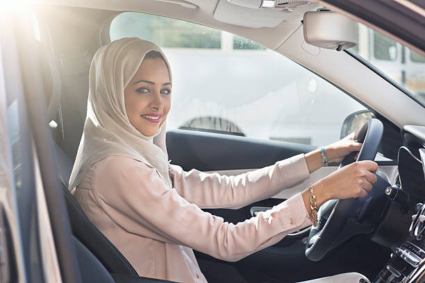 istock Emirati woman driving a car 490241486