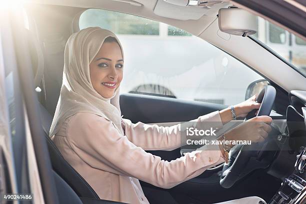 Emirati Woman Driving A Car Stock Photo - Download Image Now - Driving, Women, One Woman Only