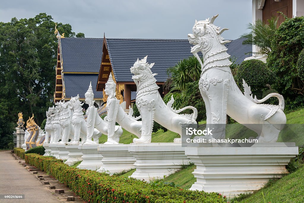 lion statue A great white lion in Thai temple ,temple is a public area and can take photo Thailand Stock Photo