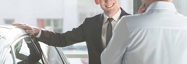 istock Smiling man by the car 490242162