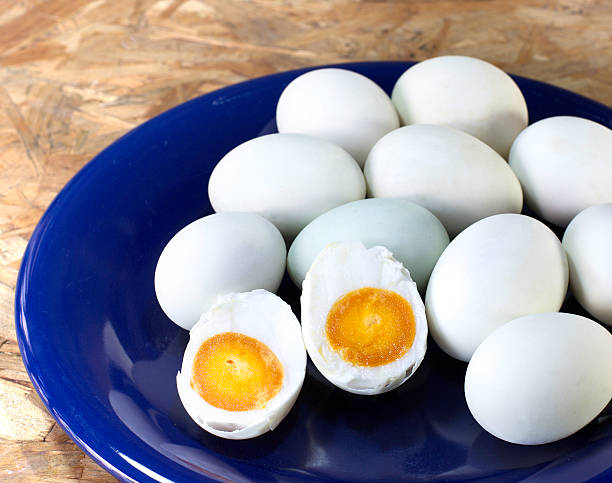 istock Salted egg in the blue dish on wooden table 490244848