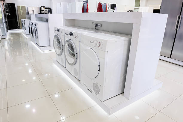 istock washing mashines in appliance store 490247426