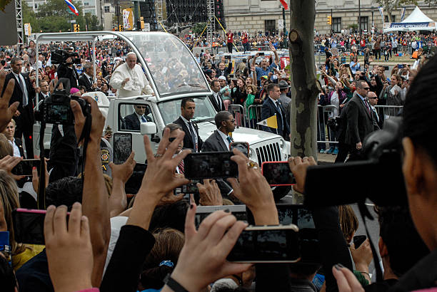 Pope Francis Arriving at Benjamin Franklin Parkway Philadelphia, PA. USA - September 27, 2015; Pope Francis arriving for Mass with over 800,000 adoring admirers and followers.  benjamin franklin parkway photos stock pictures, royalty-free photos & images
