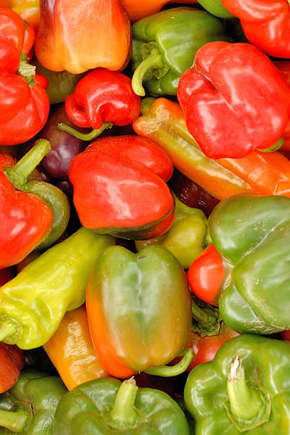 istock Various red and green peppers ready for sale 490250576