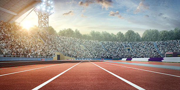 stadium with running tracks Sunny . sport stadium with crowds of people at the background. On behind the stadium are green trees. The image was made in 3d. sports track stock pictures, royalty-free photos & images